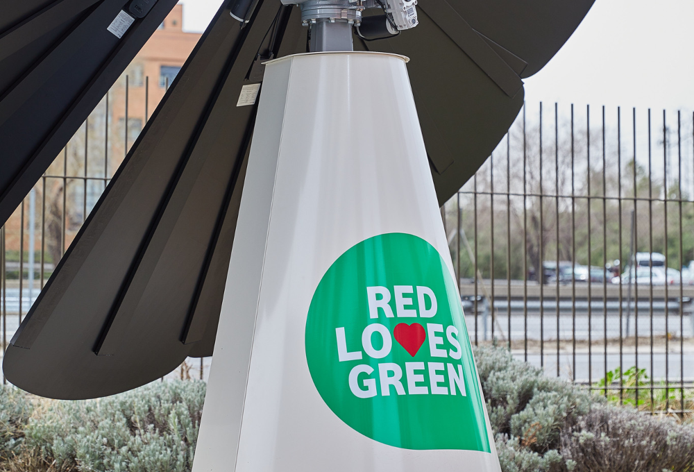 SmartFlower base close up showing a custom design for Vodafone of a green raindrop with 