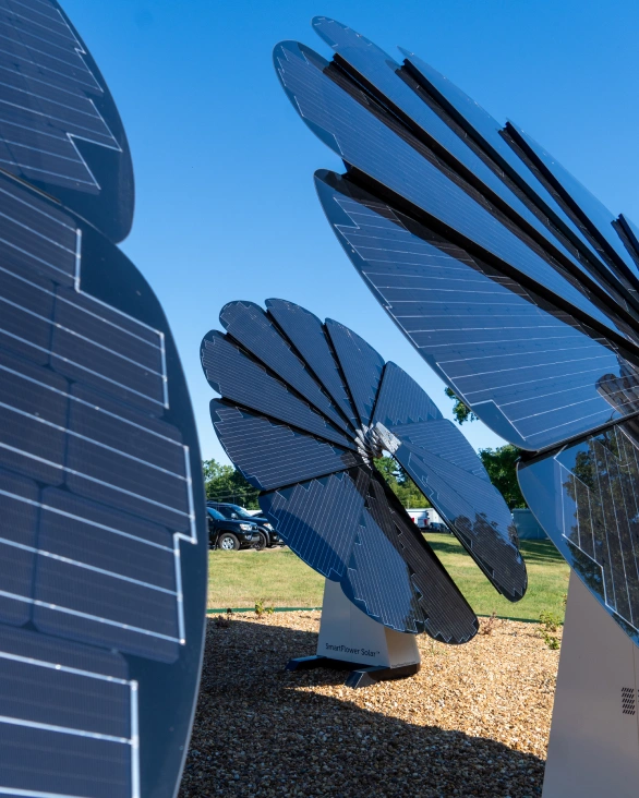 Solar systems fully deployed, actively capturing sunlight on a bright, clear day